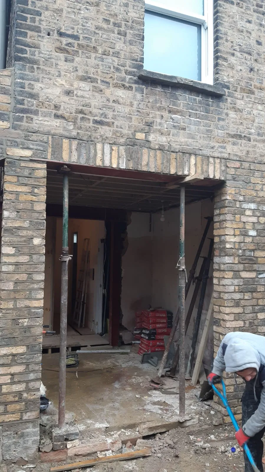 Rear wall opened up with steel beams during extension build