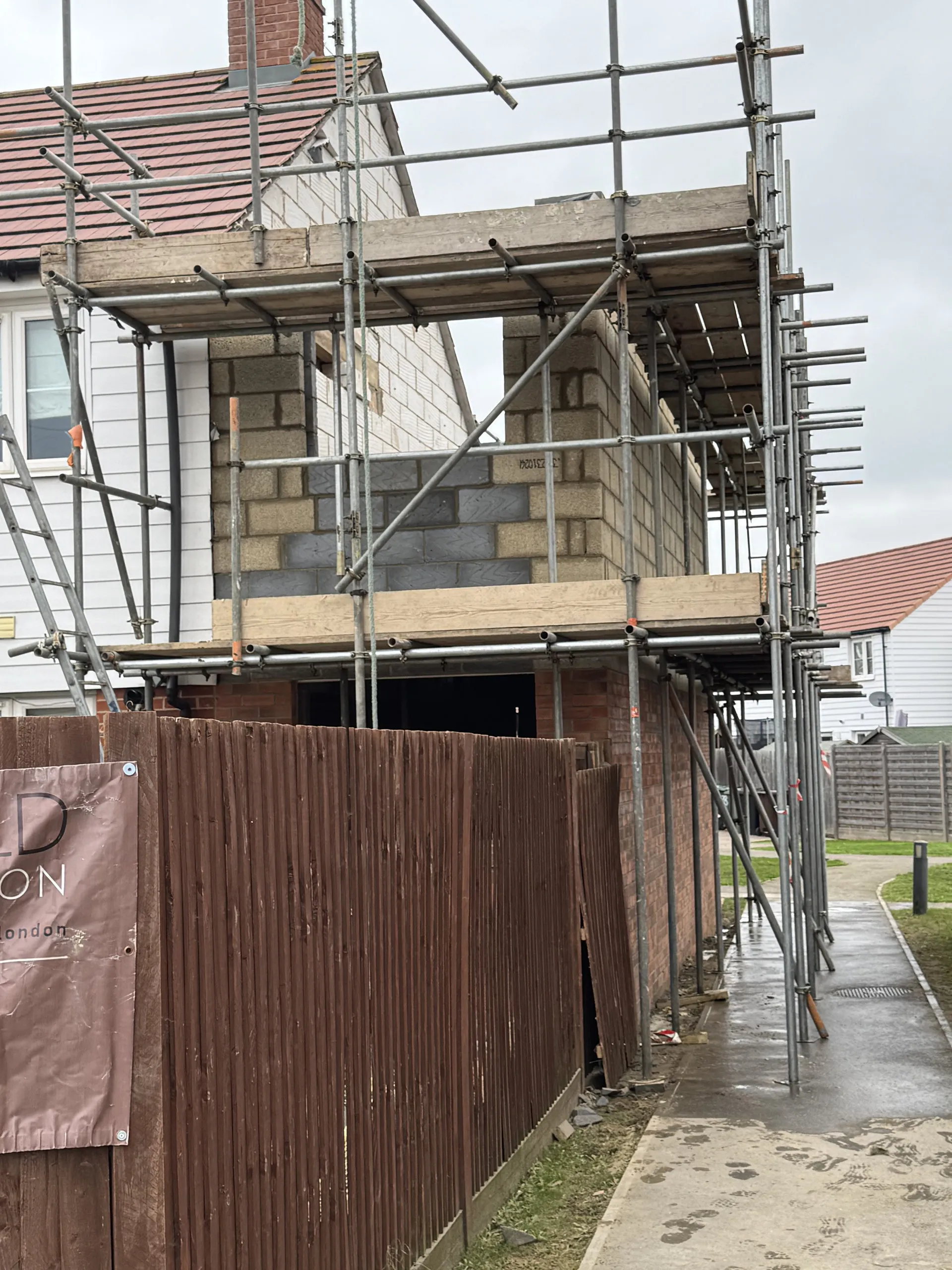 Scaffolding up with blockwork extension going up