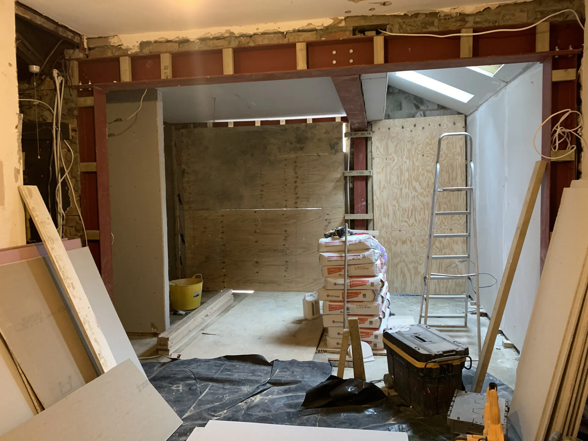 Open-plan extension with steelwork during construction