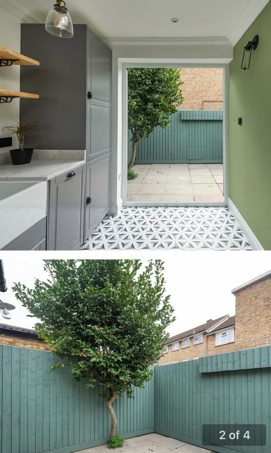 Kitchen with sage green walls, geometric floor tiles and grey cabinets